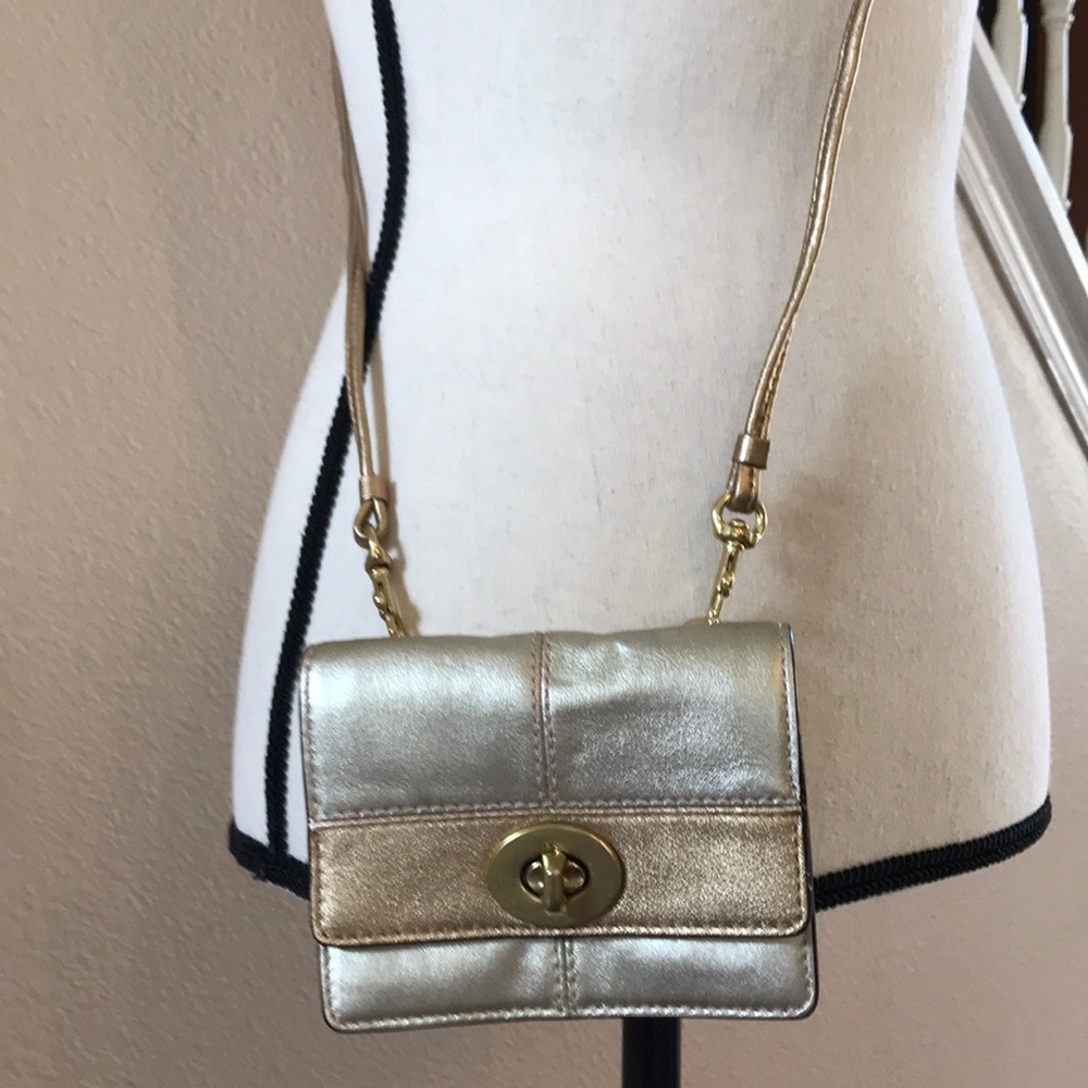 Coach mini crossbody in gold.